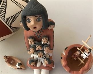 Acoma pottery story teller doll and pottery bowl.