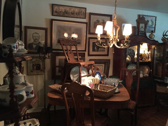 Looking into the Dining Room, wonderful art, great tiger oak table with large lion feet, oak chairs, vintage chandelier