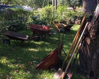 Old wheel barrows, garden carts and garden tools
