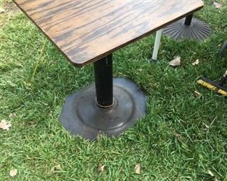 Vintage table with metal base.