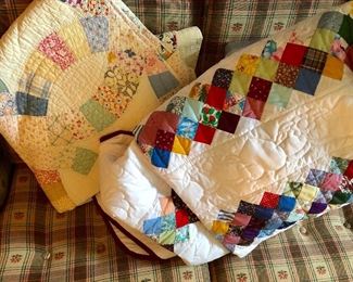 Many new quilts (quilt on left handmade, vintage)
