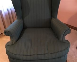 Teal wingback chair with cherry wood legs.  Very good condition.  45"h x 35"w x 22"d.  $50