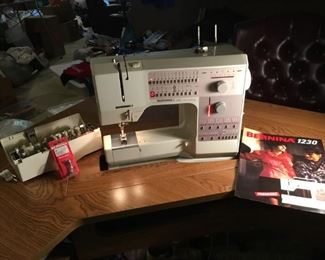 Bernina 1230 sewing machine and cabinet.  Excellent condition!  $450