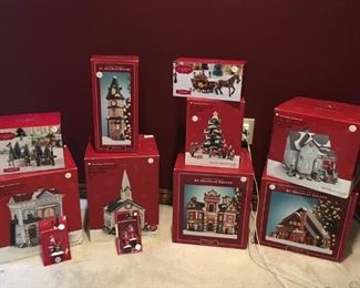 Various St Nicholas Square Village Collection pieces. Just in time for the holidays!