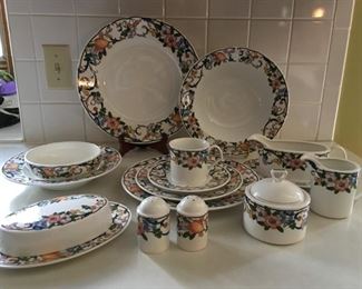 Mikasa "Magical Meadow".  Very good condition.                 * 8 Dinner Plates  *8 Salad Plates  *8 Cups & Saucers          *8 Soup Bowls   *5 Cereal Bowls   * Gravy Boat & Plate      *Cream & Sugar Bowls   *Salt & Pepper Shakers                  *Butter Dish & Cover    *2 Large Serving Bowls                    *1 Large Platter .        Entire Set for $60 