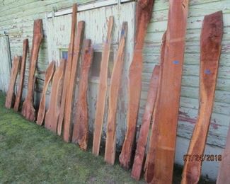 slab wood some with live edge all rough cut for table tops or shelves.