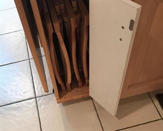 Chairs are stowed inside when not in use. Great for small apt's!