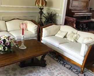 Cane back Sofa and Love Sea, Cocktail Table, End Tables, Lamps and Rug for sale