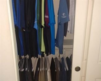 Several men's clothing items, slacks, jackets, polos, suit jackets, casual shirts,
