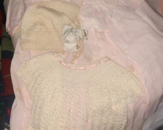 Several vintage baby clothes