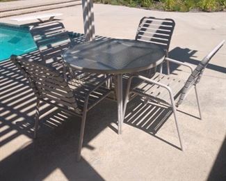 Two tables EACH with 4 chairs so 8 in total!