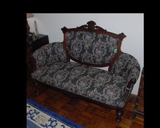 1870s Renaissance Revival settee and matching side chair.