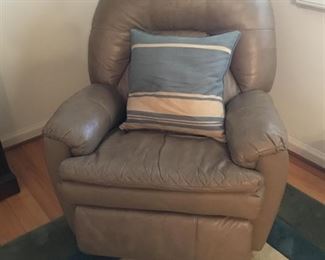Leather recliner that also rocks.