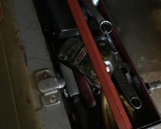 Tool box full of tools.