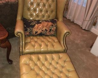 Leather tufted wingback chair and ottoman