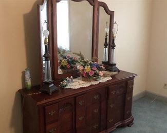 Dresser with triple folding mirror