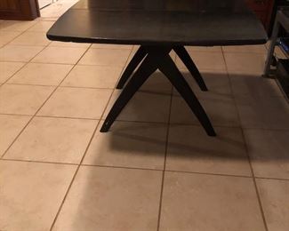 Super cool MCM atomic styled legs, ebonized wood.
Sides fold down
