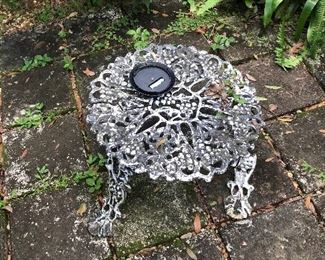 Ornate table, broken leg