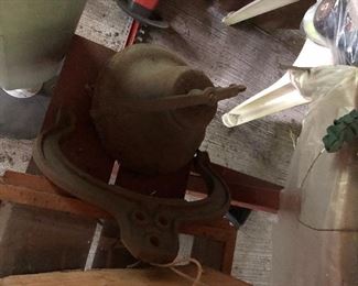 Iron bell. About 12” diameter. A piece of the yoke is broken off