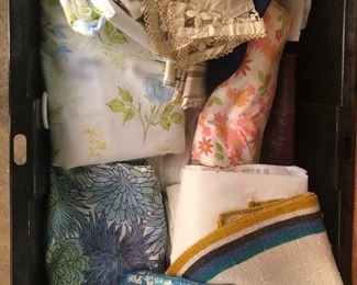 A load of vintage fabrics, linens