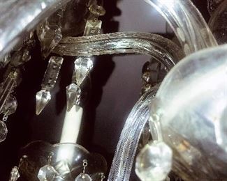 Chandeliers, the glass arms are all cut glass as well!