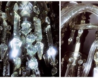 Close-up detail of Cut glass chandelier arms and crystals