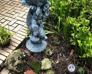 Large garden statue of Boy and a fish