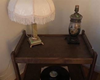 TV cart, antique marble based lamp, working. Some records.