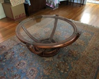 1970's round glass top coffee table.