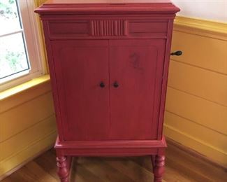 Antique Victrola. Painted red. Nice piece. 