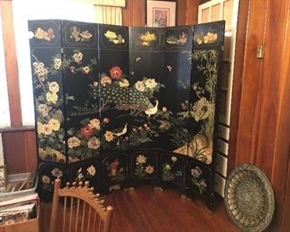 Oriental screen. Enamel with inscribed design.