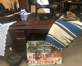 Horse blanket, ginger jar, antique sewing machine, vintage sign