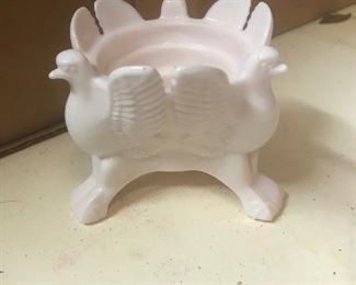 One of a pair of Vintage Jeannette shell pink milk glass 3-footed "Eagle" Candle holders