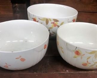 Three vintage floral serving bowls, one in back marked Hall