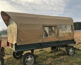 Side view of modern covered wagon