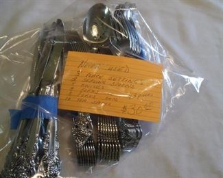 Never used flatware.  8 place settings.