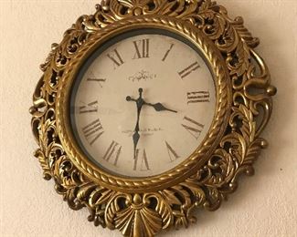 Gold framed round wall clock