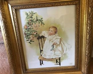 Gold frame with infant
