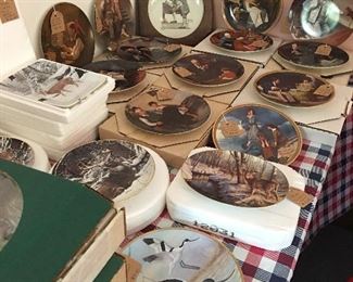 Norman Rockwell and Wilderness Plates all with original boxes and certification.