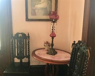 19th Century carved oak barley twist chairs, parlor table, cranberry buffet lamp