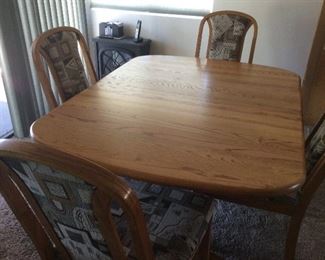 Oak dining table with 4 chairs