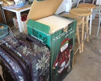 Luggage, big snowman