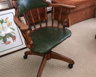 Vintage green leather swivel office chair