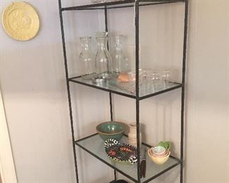 Metal & glass shelf w acrylic pitcher & wine glasses, pottery, terra-cotta, and griddle