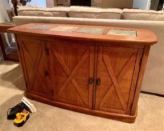 Very nice piece of furniture.  Can be used as a buffet, Foyer/ Sofa Table or a Bar 