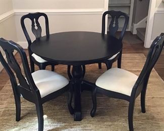 Dining room table and four chairs https://ctbids.com/#!/description/share/189834