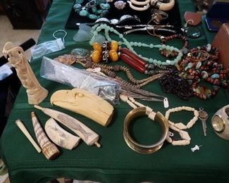 carved pieces and bone necklace