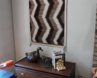 Navajo rug and antique office chest