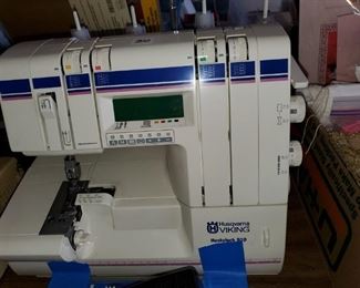 Viking 910 Embroidery Serger - Google IT! FEATURES:
Computerized
Free Arm
Adjustable Stitch Length and Width
Adjustable Presser Foot Pressure
3 Thread Serger
4 Thread Serger
Differential Feed
Rolled Hem AND MORE!-