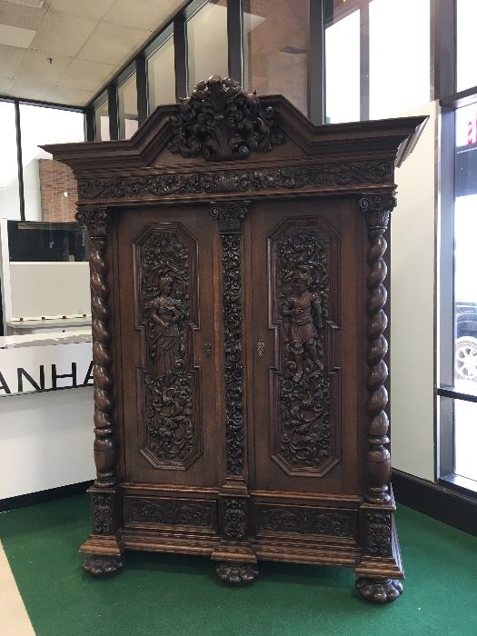 An impressive antique Italian armoire wardrobe carved to superior standards and in extremely well kept condition. Purchased from a NY gallery and placed in a Tower Grove North home. Knockdown precision makes it surprisingly easy to move.